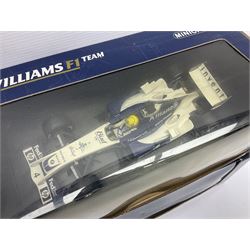 Four Minichamps 1:18 scale die-cast racing cars - Williams F1 Team BMW FW26 R. Schumacher; McLaren Mercedes MP4-12 D. Coulthard; McLaren Mercedes MP4-13 M. Hakkinen; and Formel 1 Jordan peugeot EJR 195 E. Irvine; all boxed (4)