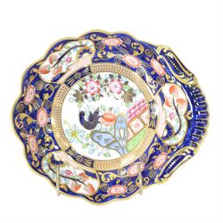 Copeland Spode Imari dish, in the form of a shell, the central panel decorated with a bird...