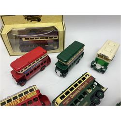 Two Brimtoy tin-plate model double decker buses, without keys, along with eight Lledo modern die-cast buses 