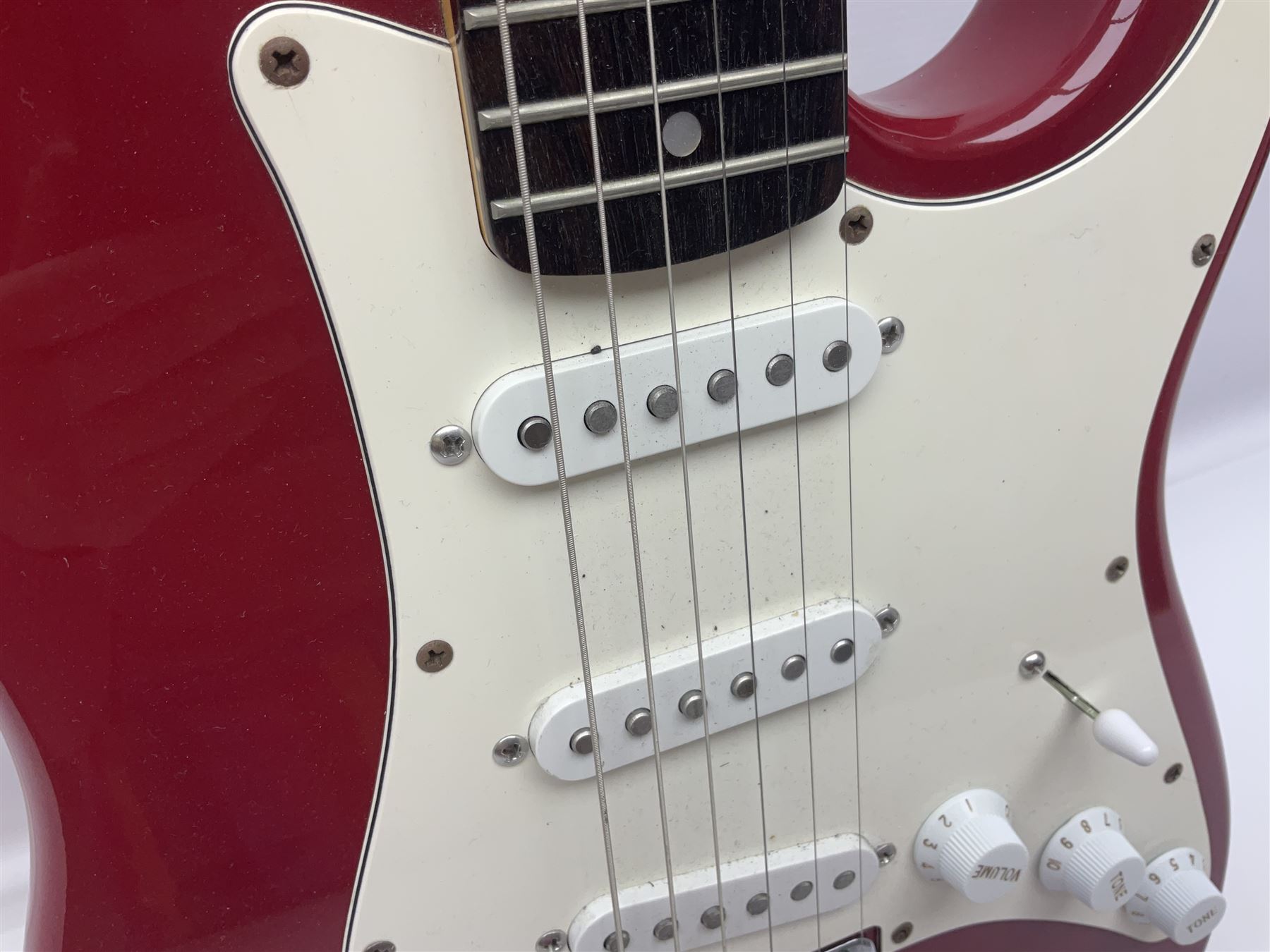 1990s Korean Squier Fender Stratocaster electric guitar in cherry red; serial no.S965951, L98cm