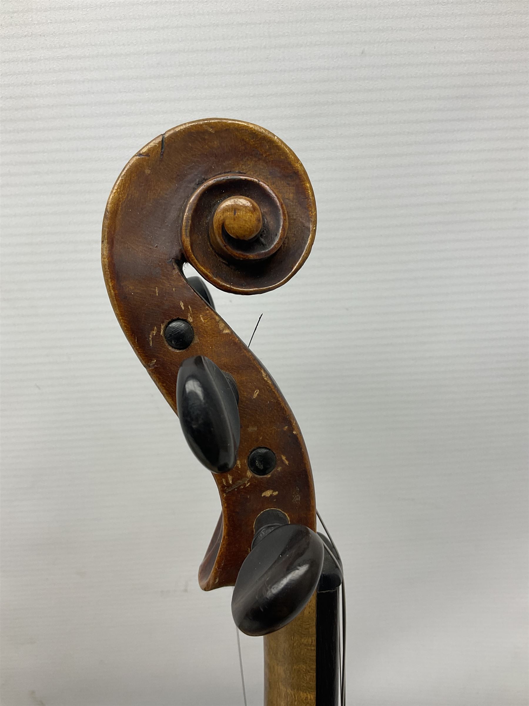 German copy of a Maggini violin c1900 with 35.5cm two-piece maple back and ribs and spruce top, bears label 'Maggini Deutsche Arbeit 1866' L59cm; in carrying case with bow