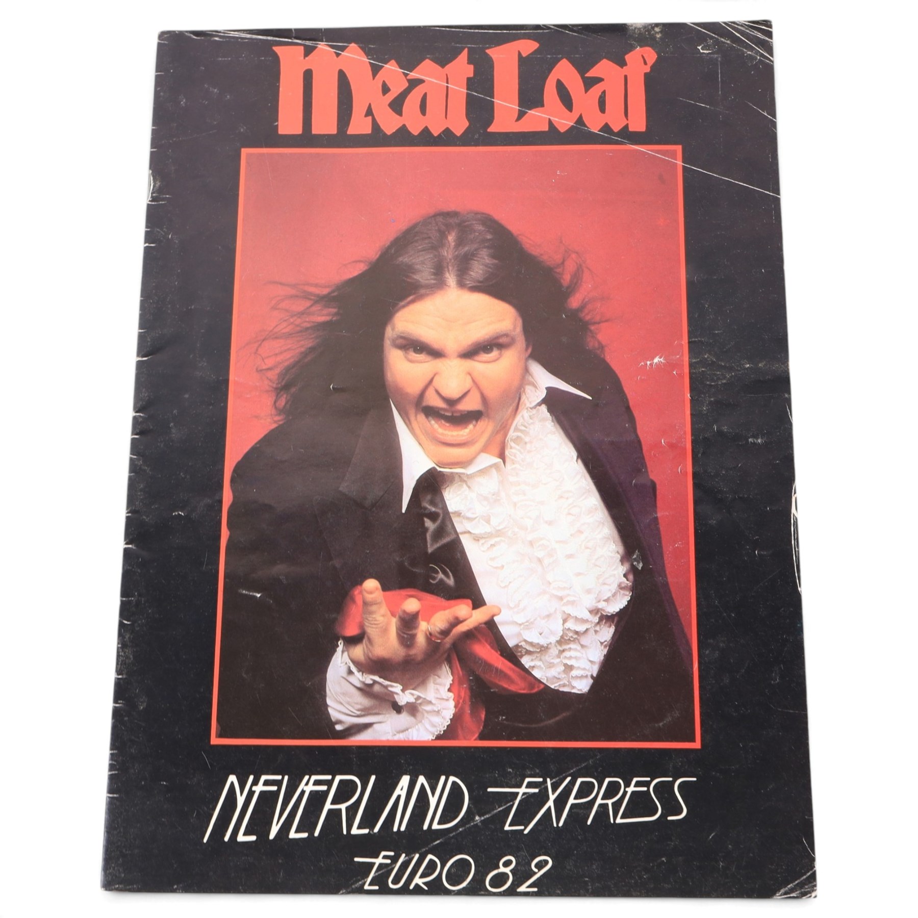 1982 Meatloaf Neverland Express tour scarf and programme, together with a 1984/5 Meatloaf tour t-shirt