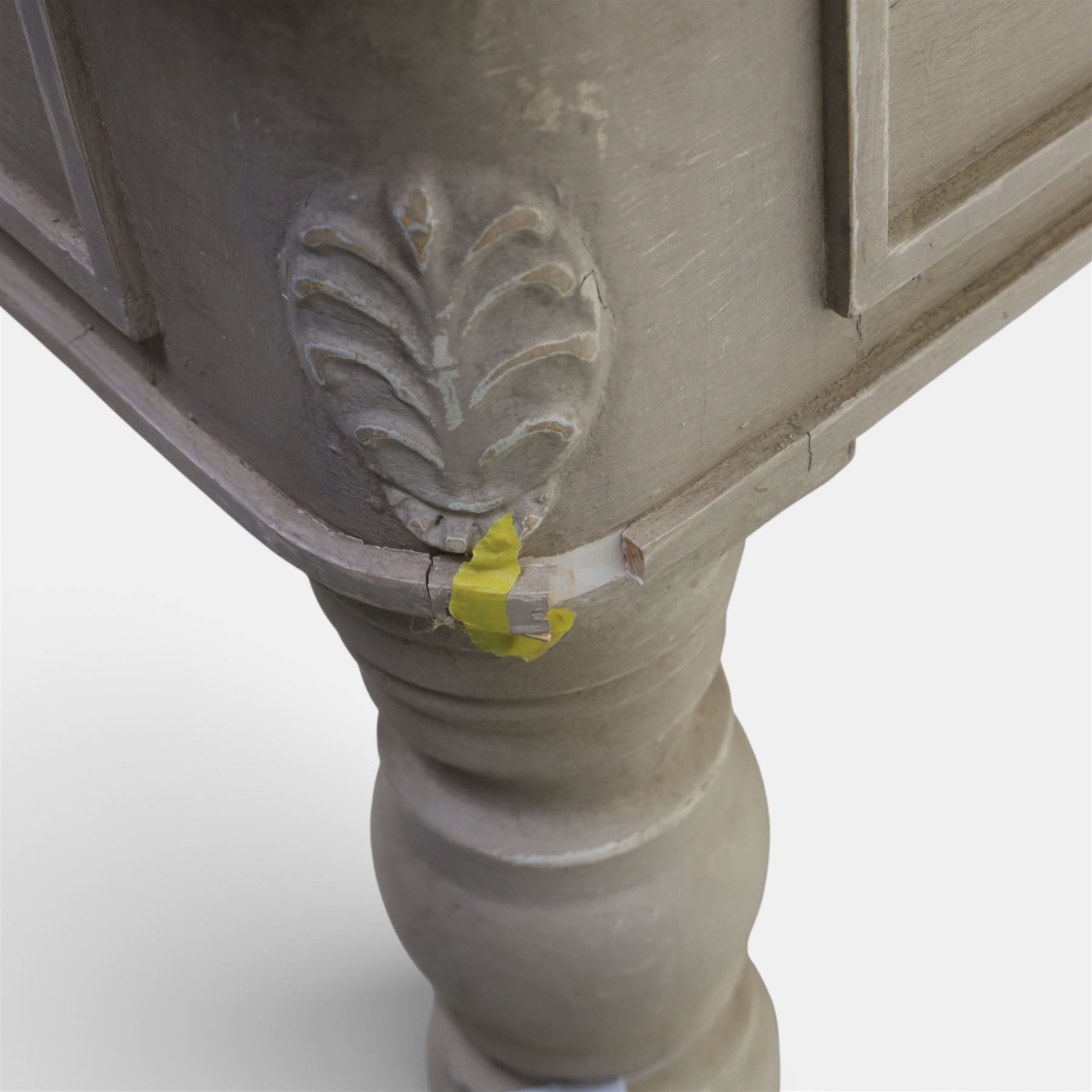 A pair of 19th century style pine console tables, with rectangular simulated marble top over a painted frieze, raised on fluted and turned tapering legs