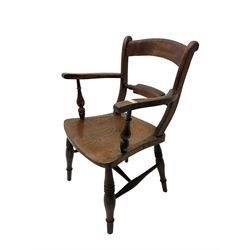 Late 19th century elm and beech Oxford bar back armchair, centre rail shaped with flanking bead turning, swept arms, raised on ring turned supports (W55 H91); 