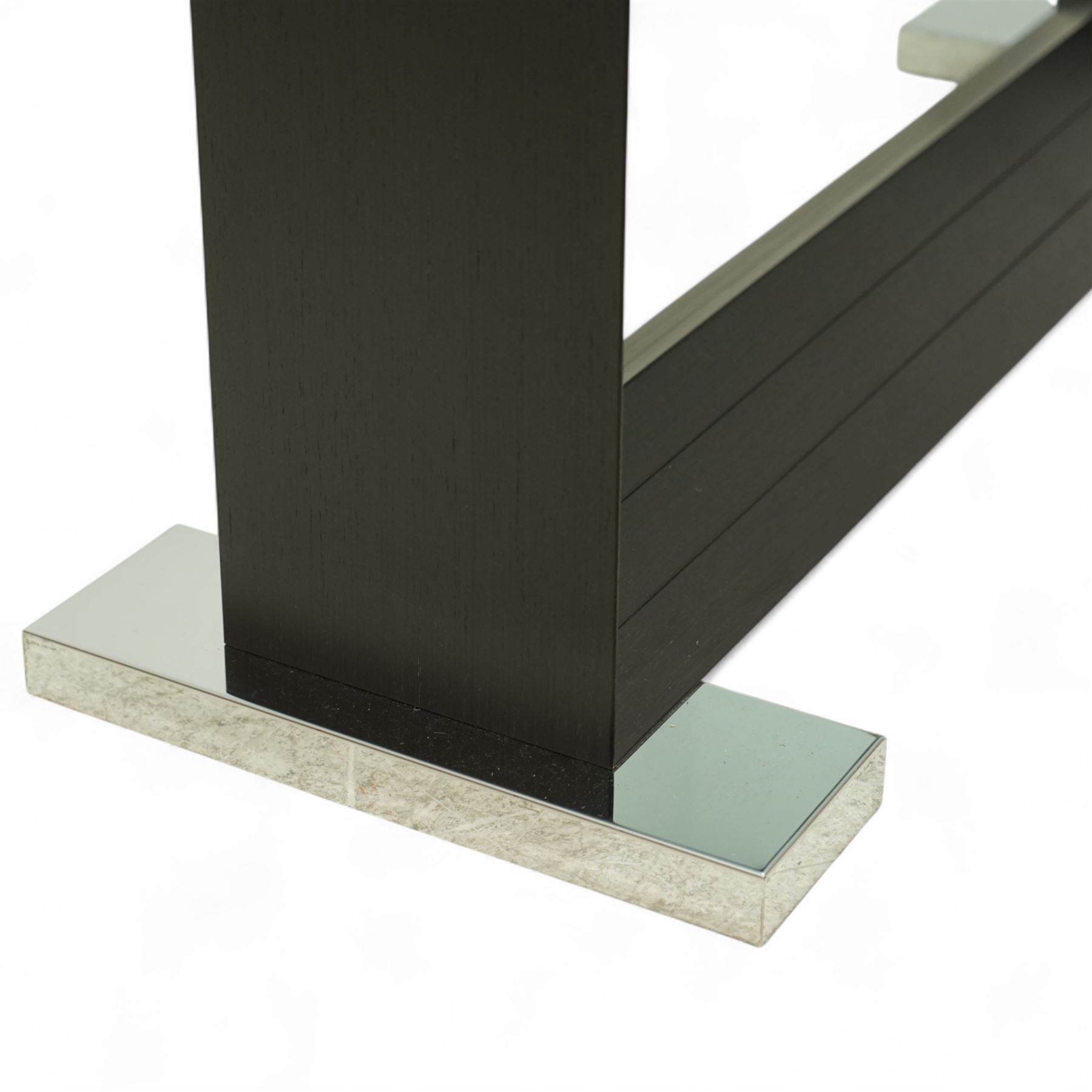 Cattelan Italia - Monaco glass top dining table on wenge base, bevelled and rounded edge clear glass top supported by twin angled black veneered uprights on a rectangular stretcher base, raised on brushed steel foot plates