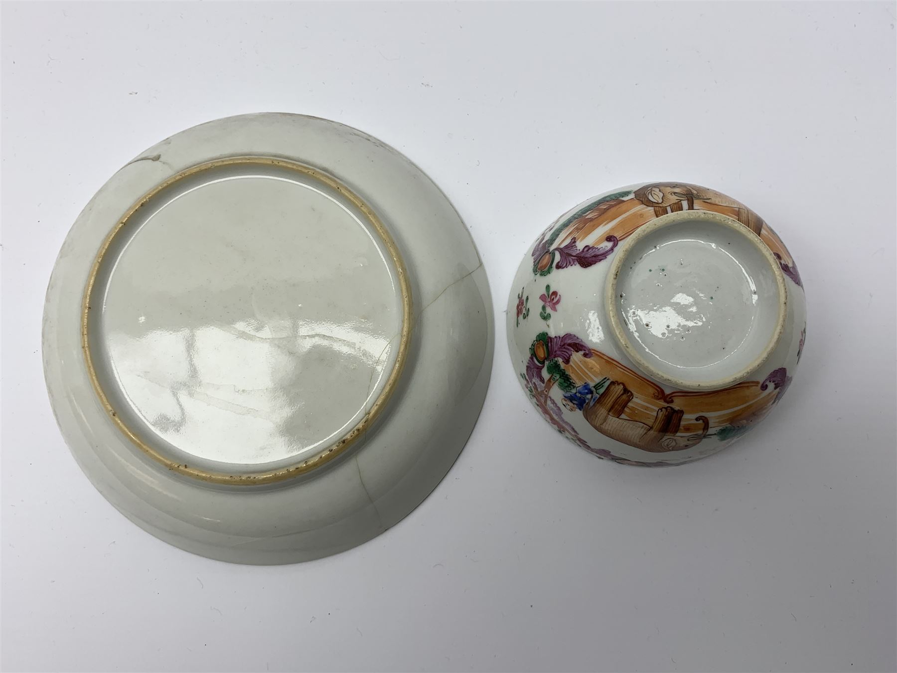 18th Century Chinese export tea bowl and saucer, decorated in the Famille Rose pallet with figures and elephants, tea bowl D8.5cm, saucer D13.5cm