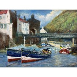 Jack Rigg (British 1927-): Cobles Moored in Staithes Beck, oil on board signed and dated 2012, 34cm x 44cm