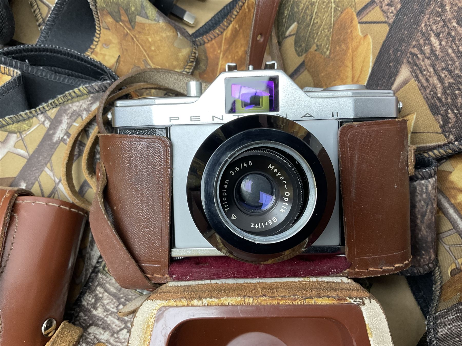 Rocwing photography studio lighting stands and shades, together with digital cameras and other camera equipment, in three boxes  