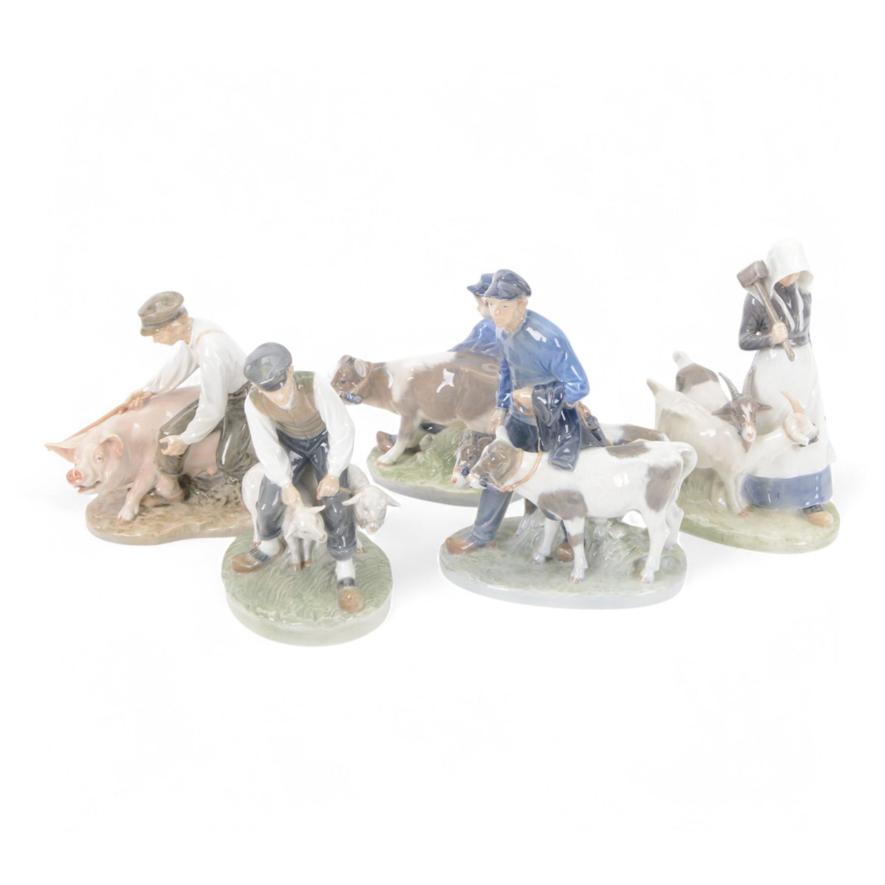 Five Royal Copenhagen porcelain figures of farm animals, comprising Boy with Pig no 848, Boy with Calf no.772, Boy with Sheep no 627, Boy with Calf's no.1858, Girl with Goats no 694