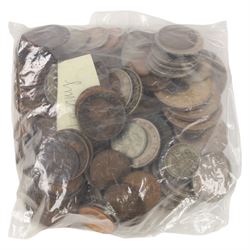 Approximately 250 grams of Great British pre-1920 silver coins, together with further British and world coins, in tartan biscuit tin