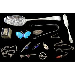 Collection of silver brooches including butterfly enamel brooch by J Aitkin & Son, Birmingham 1918, George III silver spoon by William Fearn, London 1774, with later fruit decoration, pair of silver sugar tongs, knife and thimble, stamped or hallmarked