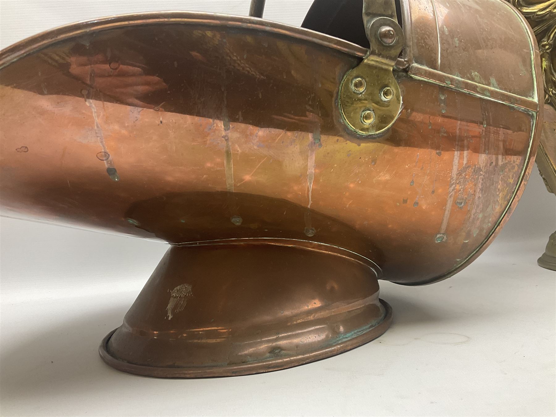 Victorian Benham & Froud Arts and Crafts brass coal scuttle, with Victorian diamond registration mark, together with a copper and brass scuttle of helmet form, tallest H50cm