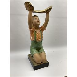 Art Deco plaster figure modelled as a young boy kneeling with his arms above his head holding a dish, marked OP 416, Rd 828834, H61cm