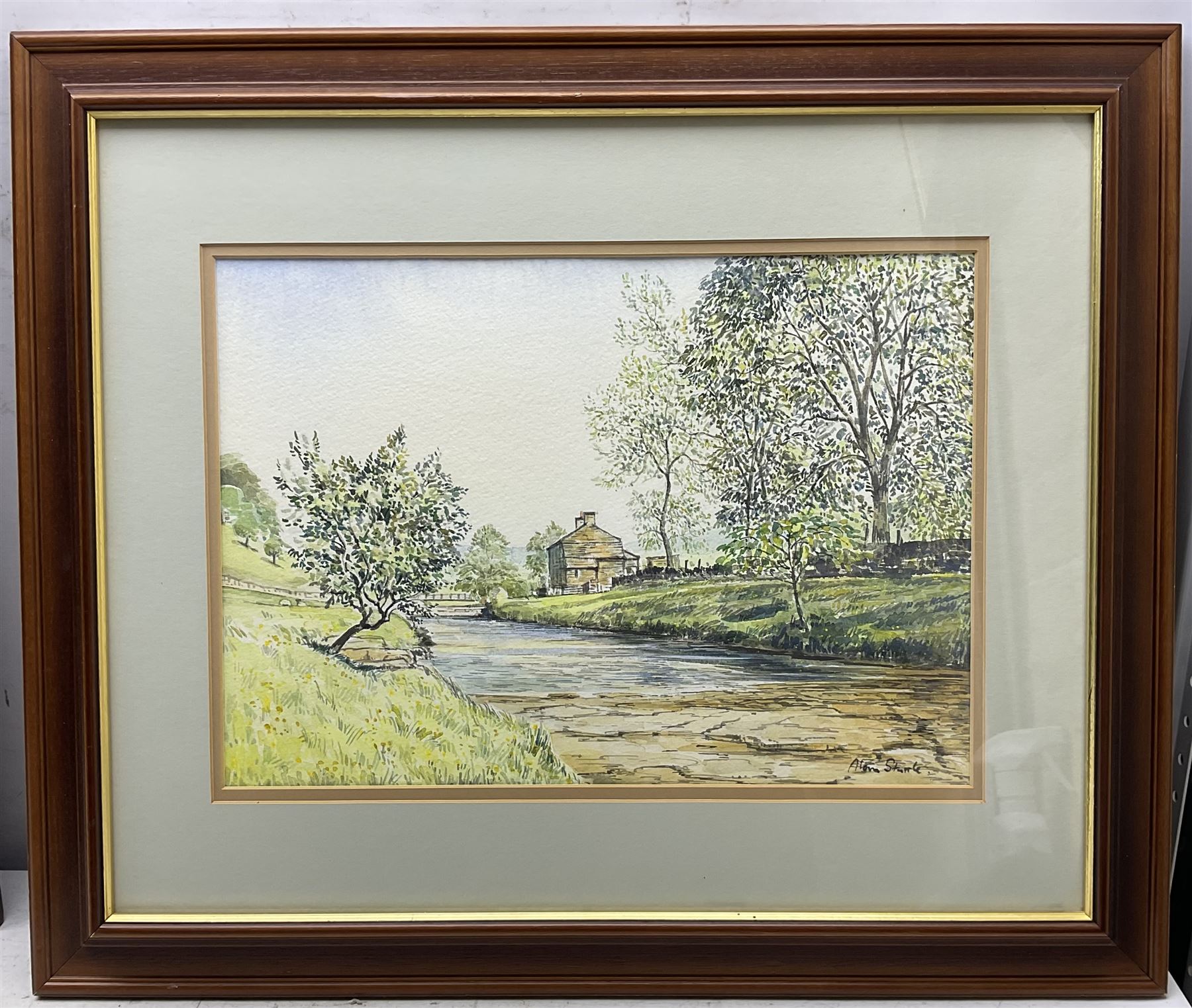 Alan Stuttle (British 1939-): Rural River Landscape, two watercolours signed max 53cm x 72cm; 'Wilton - Middlemass', watercolour signed with monogram and titled 33cm x 43cm (3)