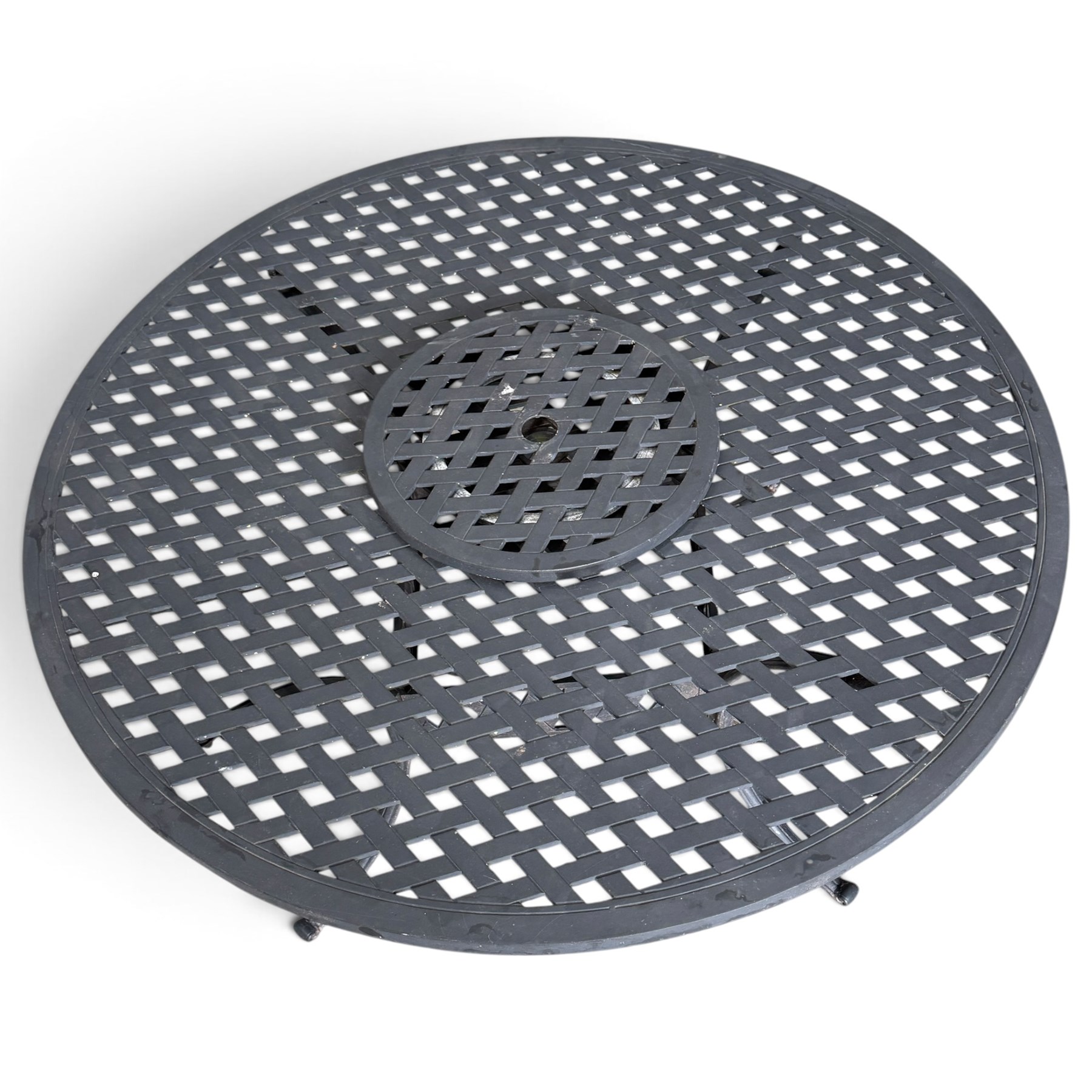 Grey-painted cast metal garden dining suite, comprising circular latticework table on splayed supports (W152cm H72cm), and six matching open armchairs with lattice backs and seats (W61cm H93cm)