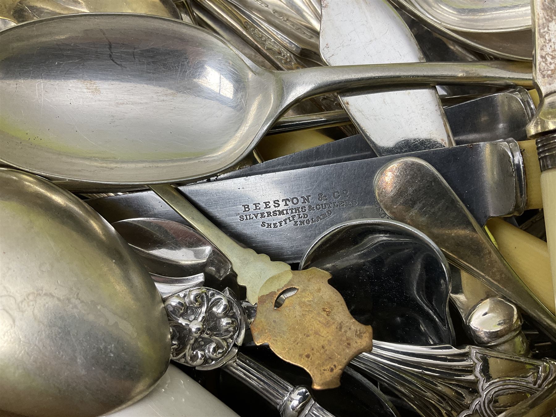 Collection of silver-plated cutlery including cased set of six EPNS cake forks, Royal Crown Derby pie server, sugar tongs, ladles, etc