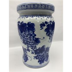 Oriental style blue and white ceramic garden seat, decorated with fruiting vines, H40.6cm