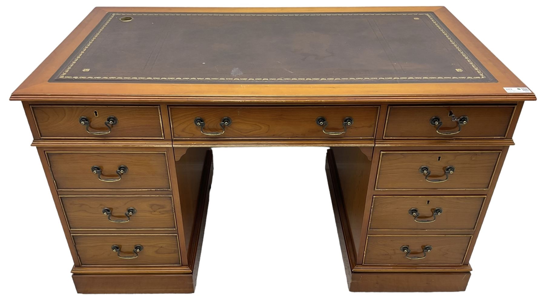 Cherrywood twin pedestal desk, rectangular leather inset top over central fall front with keyboard slide and two drawers, fitted with two drawers and cupboard, on bracket feet