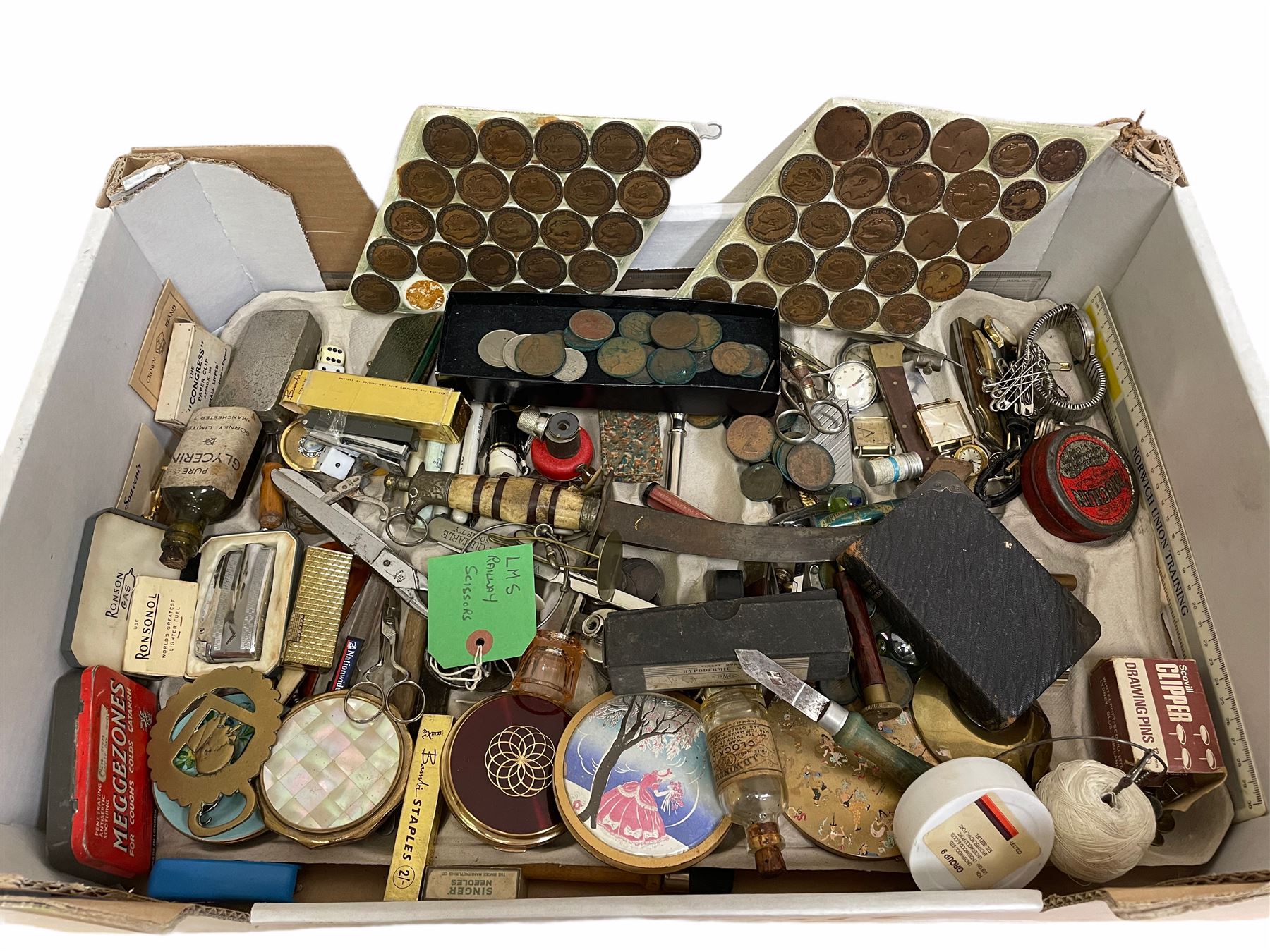 Ronson  lighter in case, Zilon Heaven lighter, Indian dagger with sectioned bone handle and eagle pommel, two lozenge shaped plaques mounted with George V pennies, other loose coins, vintage glass bottles, thimbles, powder compacts and miscellanea in one box