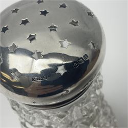 Early 20th century cut glass silver sugar caster, hallmarked C B Thomas & Co, Birmingham 1910, together with silver pepper, hallmarked, a continental silver pickle fork, stamped 800 and a plated cake fork