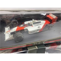 Three Paul's Model Art 1:18 scale die-cast McLaren racing cars - Mercedes MP4/11 D. Coulthard; MP4/4 A. Prost; and Mercedes MP4/10 M. Hakkinen; all boxed (3)