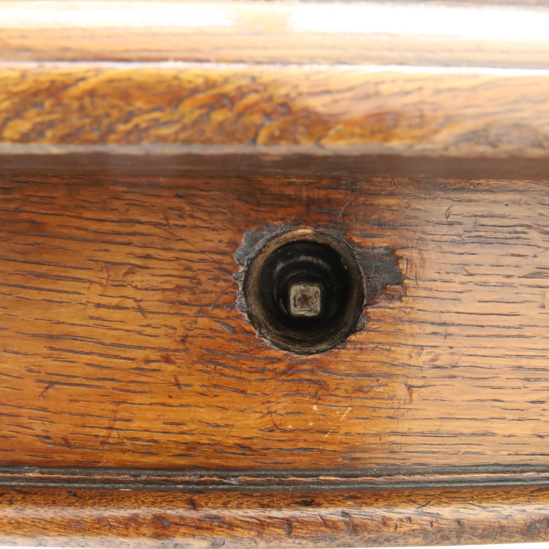 Large Victorian oak extending dining table, the rectangular top with rounded corners and moulded edge, plain frieze over large turned lobed and fluted supports terminating to brass cups and castors, with two additional leaves