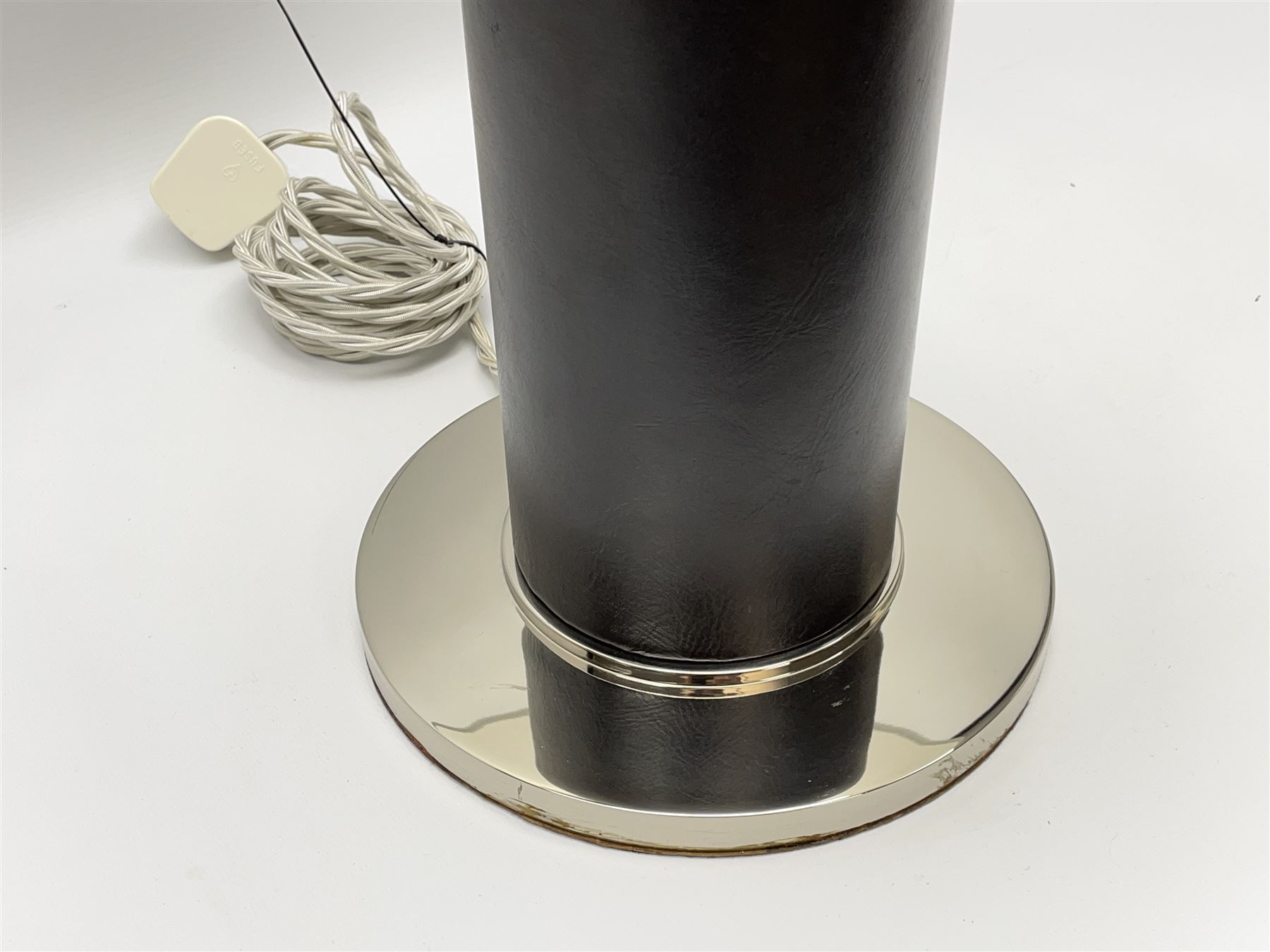 Ralph Lauren - 'Beckford' table lamp, cylindrical form in chocolate brown leather, polished metal base, with shades