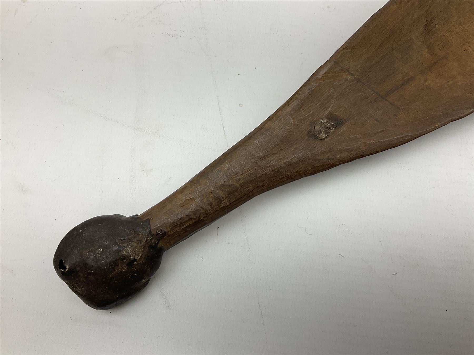 Australian Aboriginal shield, carved with Kangaroo and Emu, 74.5cm; Spear painted with aquatic creatures 78cm, and Spear thrower 81cm (3)