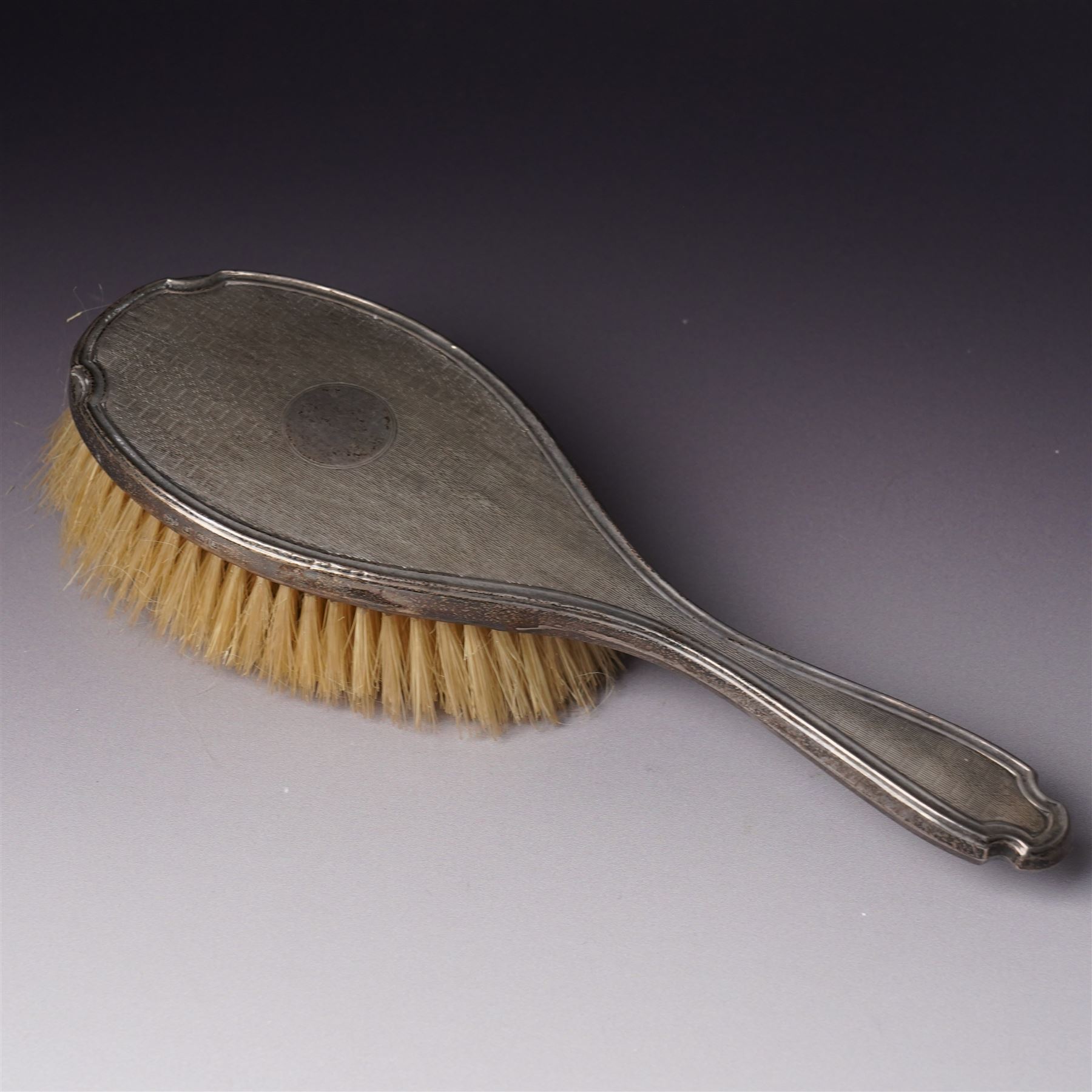 Five piece silver backed dressing table set Birmingham 1929 Maker Deakin & Francis Ltd and a Victorian glass globe scent flask with screw off silver cover  