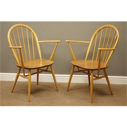  Pair Ercol 'Windsor' light elm and beech carver armchairs, stick and hoop backs  
