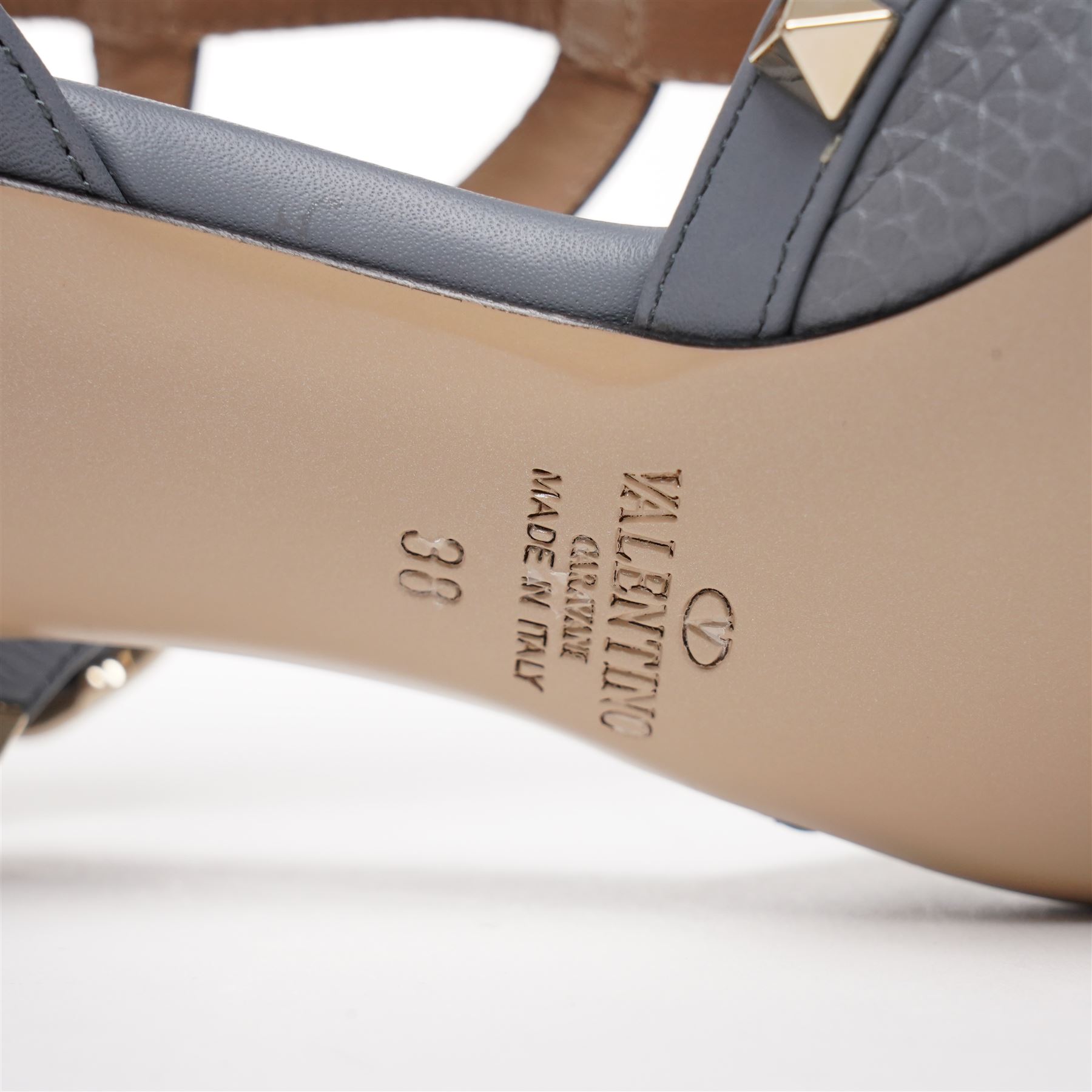 Valentino Garavani - pair of Rockstud grained leather and leather strap stiletto heels in blue, with pointed toes and gold tone pyramid stud detailing to the uppers, size 38, unused with original box and dust bag
