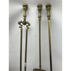 Victorian mahogany coal scuttle, the domed rolling lid carved with ornate foliate motifs opening to reveal interior with twin handled liner, mounted with carrying handle and shovel, together with brass fireside tools, largest H46cm