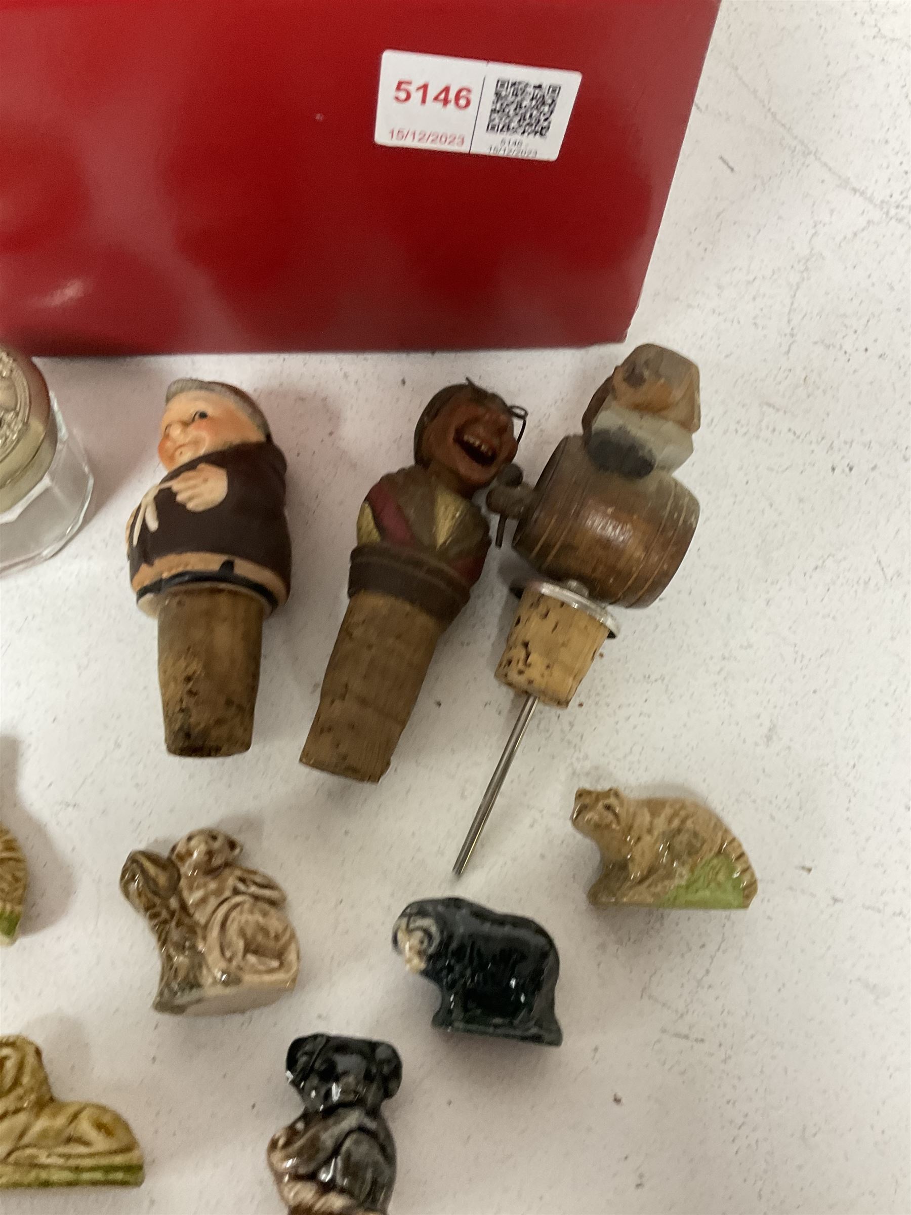 Seven Wade Whimsies, leather falcon hood, three novelty bottle corks, pair of EPNS open salts and other collectables