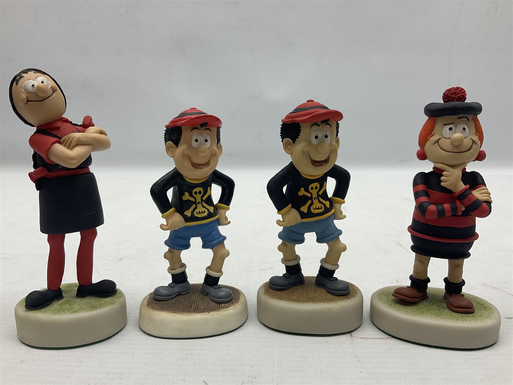 Fourteen Robert Harrop figures from the Beano Dandy collection, comprising Minnie the Minx BD04, Danny BD10, Biffo the Bear BD19, Spotty BD16, Smiffy BD09, Oops! BDS01, Little Plum BD27, Wilfrid BD15, Danny BD10, Winston BD17, 'Erbert BD14, Gnasher BD02, Beryl the Peril BD05 and Desperate Dan BD03, all with boxes