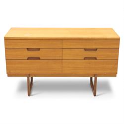 Uniflex - Mid 20th century teak sideboard, rectangular top over six drawers with recessed finger pulls, raised on U-shaped teak supports
