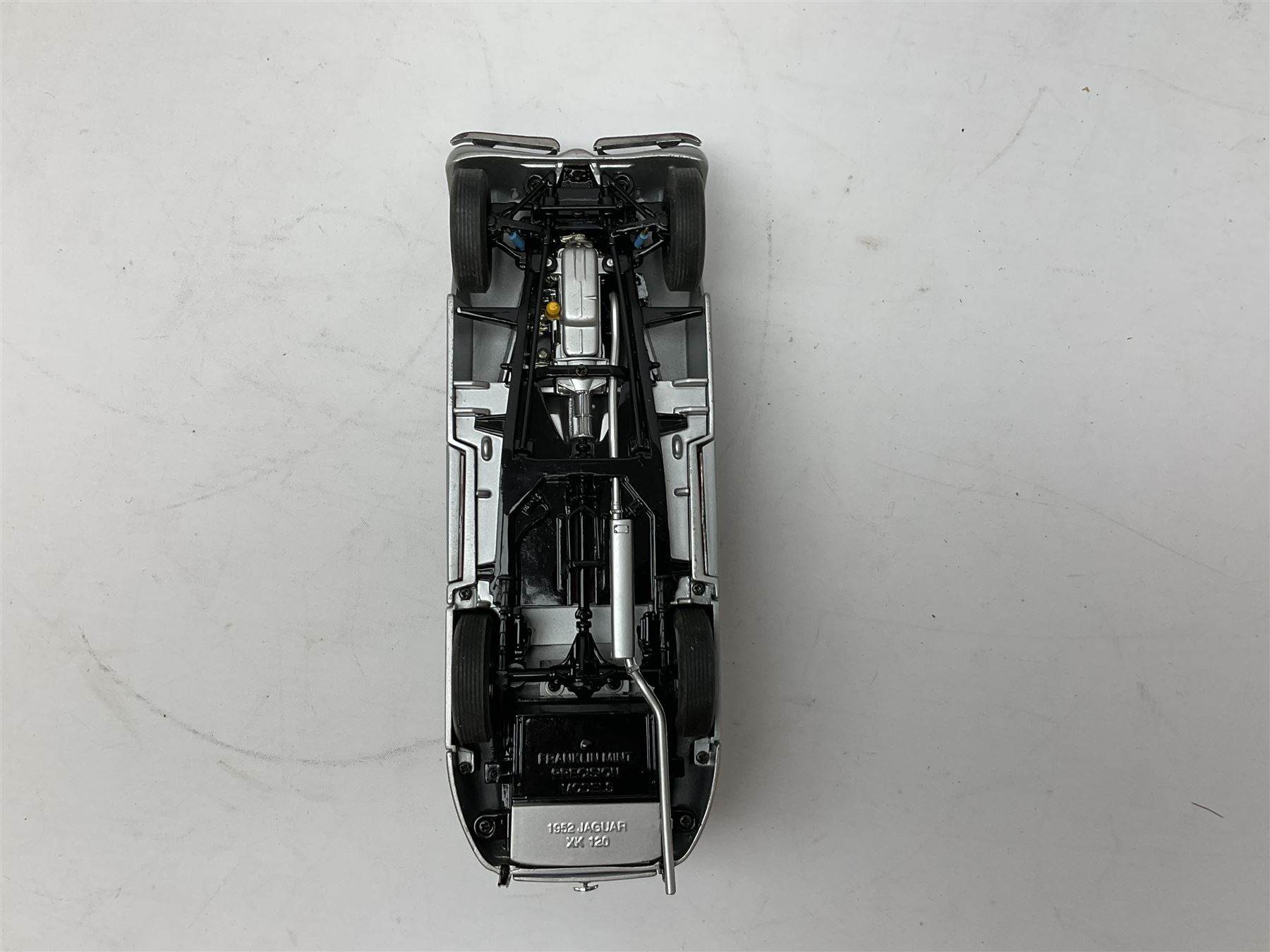 Four Franklin Mint Precision Models, one with hardwood body; large reproduction model of a vintage racing car L52cm; and four other modern metal/wooden models of vintage cars; all unboxed (9)