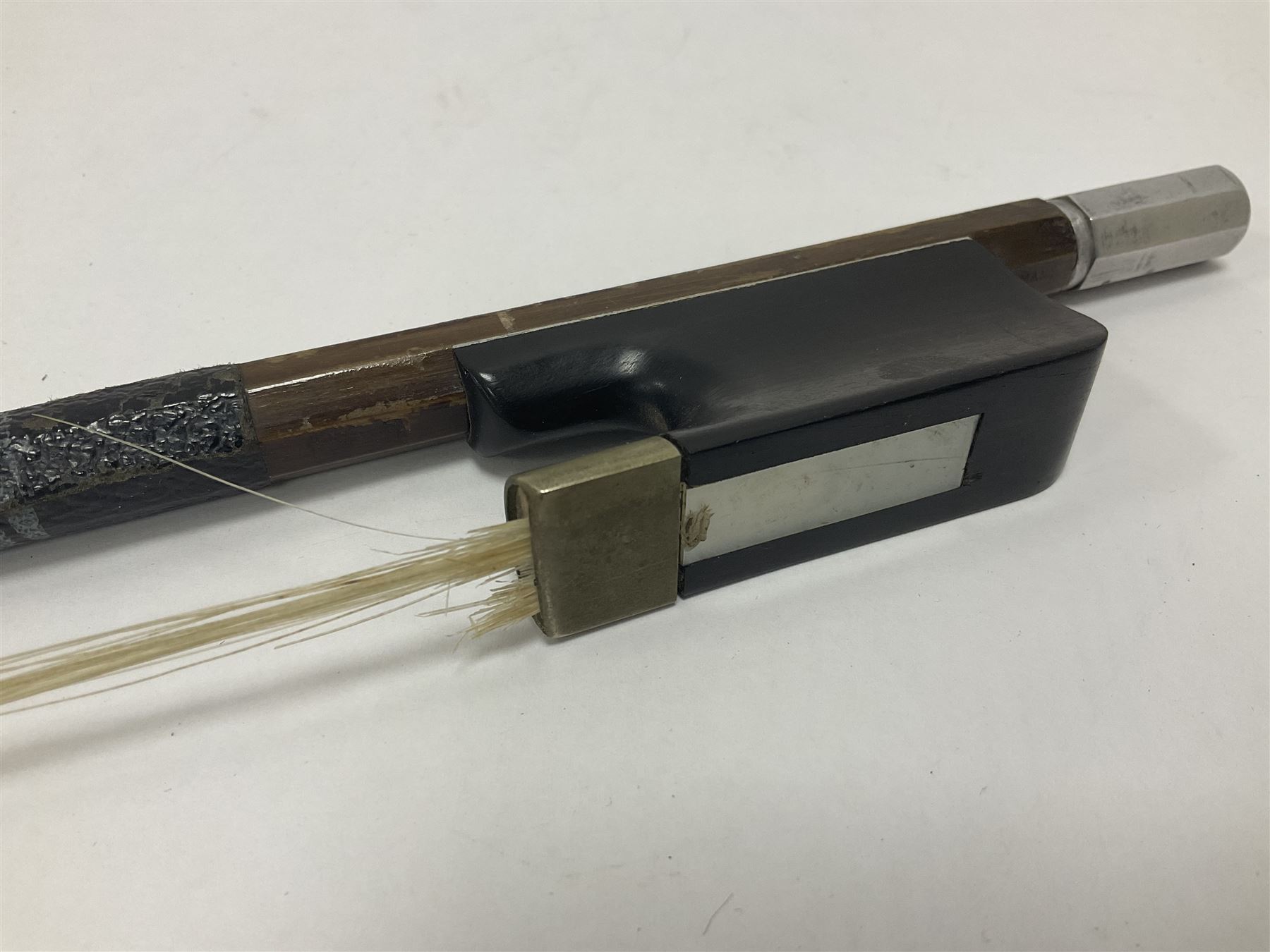 Wooden double bass bow with a mother of pearl inlay to the frog Length 71cm