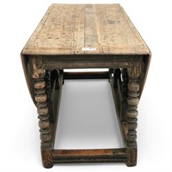 Late 17th century oak drop-leaf dining table, oval drop-leaf top on gate-leg action base, bobbin turned supports untied by moulded stretchers 