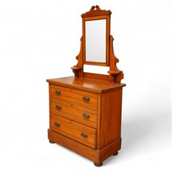 Early 20th century satin walnut wardrobe and dressing table, including a tall single wardrobe with mirrored door beneath a shaped cornice and moulded pediment, (H 205cm, D 39cm, W 91cm) and a matching dressing chest with glazed lift-top compartment and three drawers, mirror supported by scrolled uprights with flanking open shelves (H 170cm, D 45cm, W 84cm)