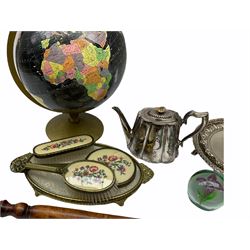 ladies vanity set with floral embroidery backs, comprising mirror, two brushes, comb and tray, along with paperweight with internal floral design, brass and copper bedwarmer, two metal serving trays, a metal teapot and a globe. 