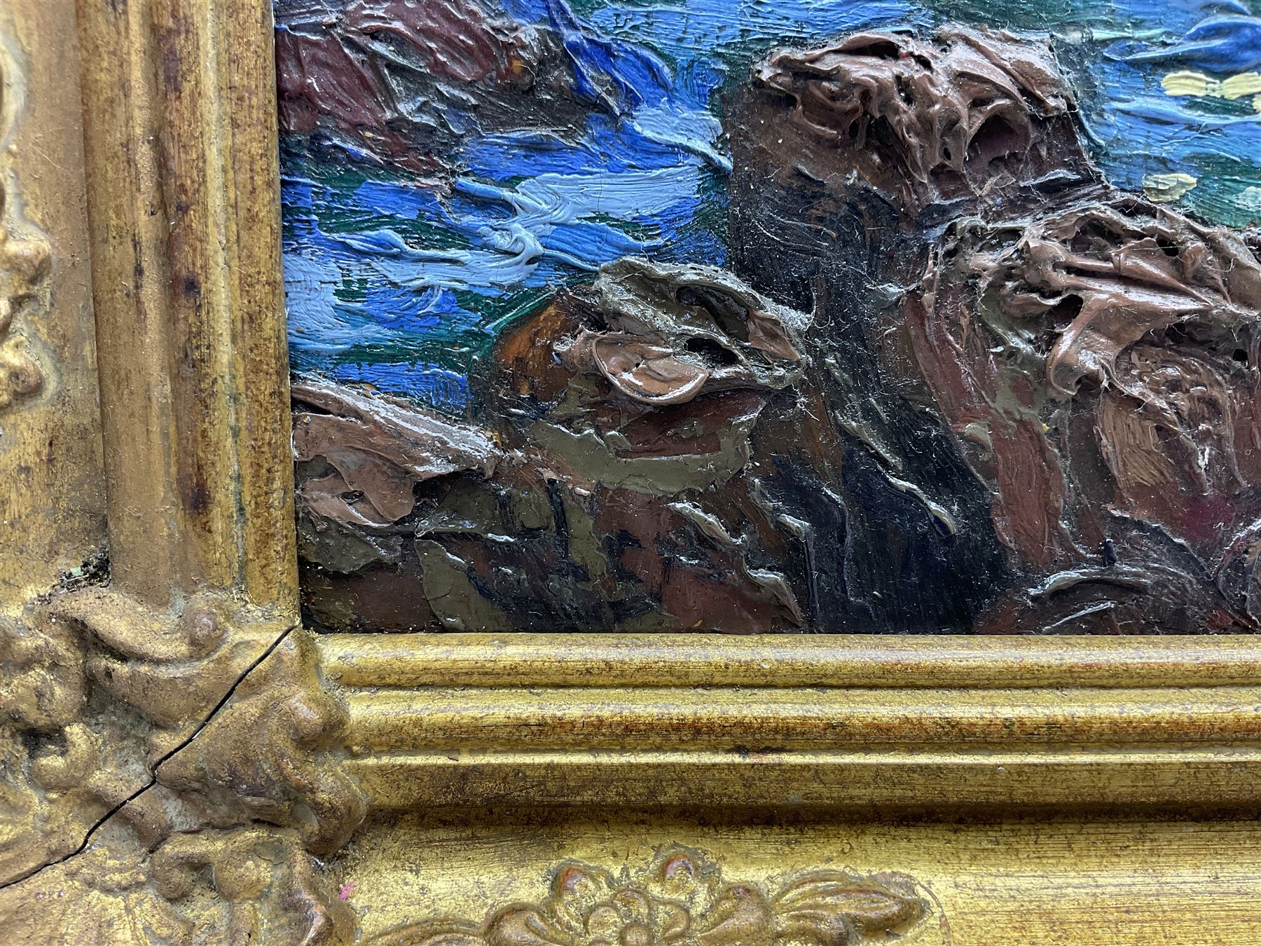 Circle of Henry Moret (French 1856-1913): Sunlit Rocky Coastline, oil on canvas laid on to panel indistinctly signed l.l. 49cm x 64cm