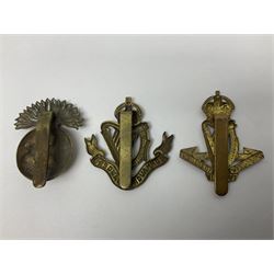 Fourteen cap badges of Irish interest including Royal Dublin Fusiliers inscribed to the slider 'From A. O'Connor 2nd Batt. Dec.2nd 1915', Connaught Rangers, South irish Horse Yeomanry, Inniskilling Fusiliers, Royal Irish Regiment etc; and seven Welsh badges including South Wales Borderers, Welsh Guards, 3rd Bn. Monmouthshire Regt. etc (21)