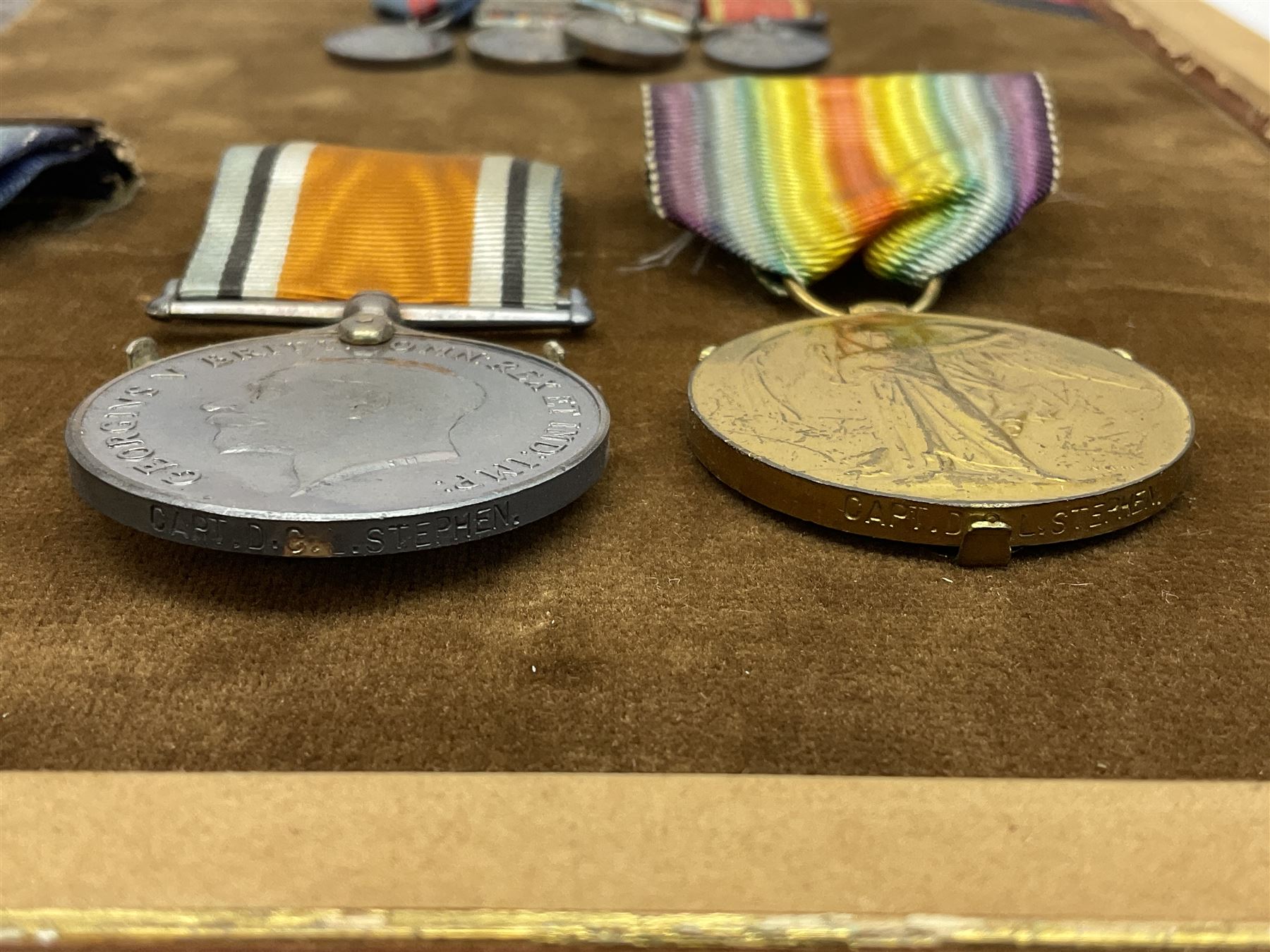 DOW Eure-et-Loir group of seven Boer War/WW1 medals comprising Queens South Africa Medal with three clasps for Cape Colony, Transvaal and Wittebergen, Kings South Africa Medal with two clasps for South Africa 1901 and South Africa 1902, Turkish Liakat Medal, George V Coronation Medal, 1914 Star with 5th Aug.-22nd Nov. 1914 bar, British War Medal and Victory Medal awarded to Captain Douglas Leslie Stephen Grenadier Guards; group of four Boer War and 1911 Coronation miniature medals; all with ribbons and later mounted and framed with his bronze memorial plaque;  together with Cecil Cutler (active 1886-1934) heightened watercolour three-quarter length portrait of Douglas in uniform, signed and dated 1915, 52 x 35cm; gilt frame; Auctioneers Note: Douglas was the elder brother of Albert Alexander Leslie Stephen (see previous lot) and died of wounds on 10th September 1914 in France.