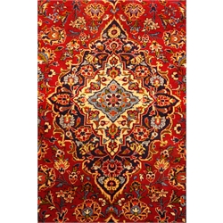  Persian Kashan red ground rug carpet, central medallion on field of interlacing stylised flowers, repeating border, 312cm x 208cm  