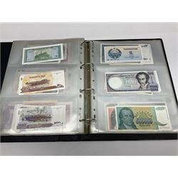 World and Great British banknotes to include Brazil, Canada, France, Germany, Ghana, Indonesia, Iraq, Hong Kong, Hungary, Japan, Vietnam, Zimbabwe, a collection of Chinese ‘Hell Money’, and quantity of ‘De La Rue Systems’ test notes, housed in ring binder and loose