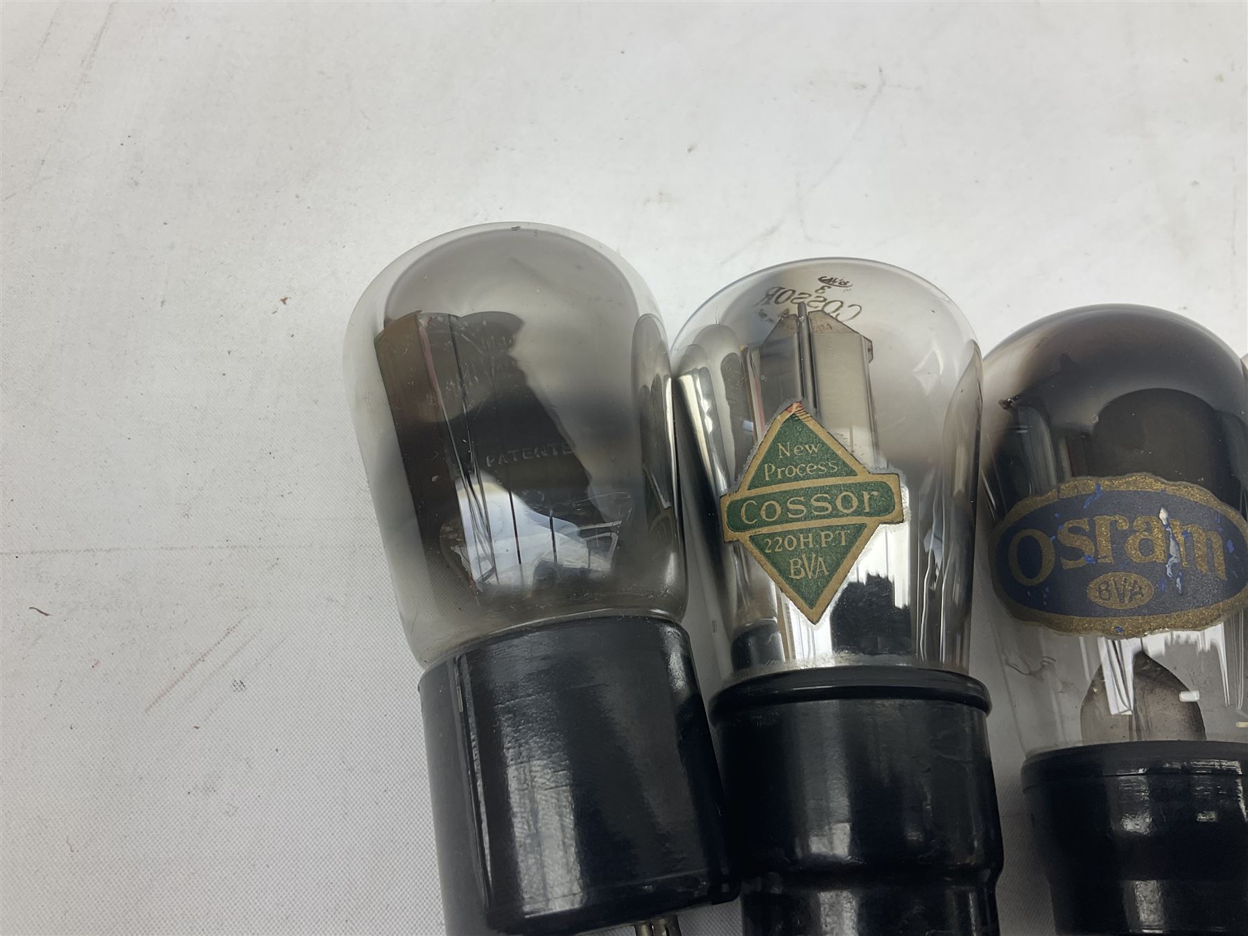 Eleven vintage radio valves, makes include Cossor, Osram, Philips etc. Including one small X-Ray tube.