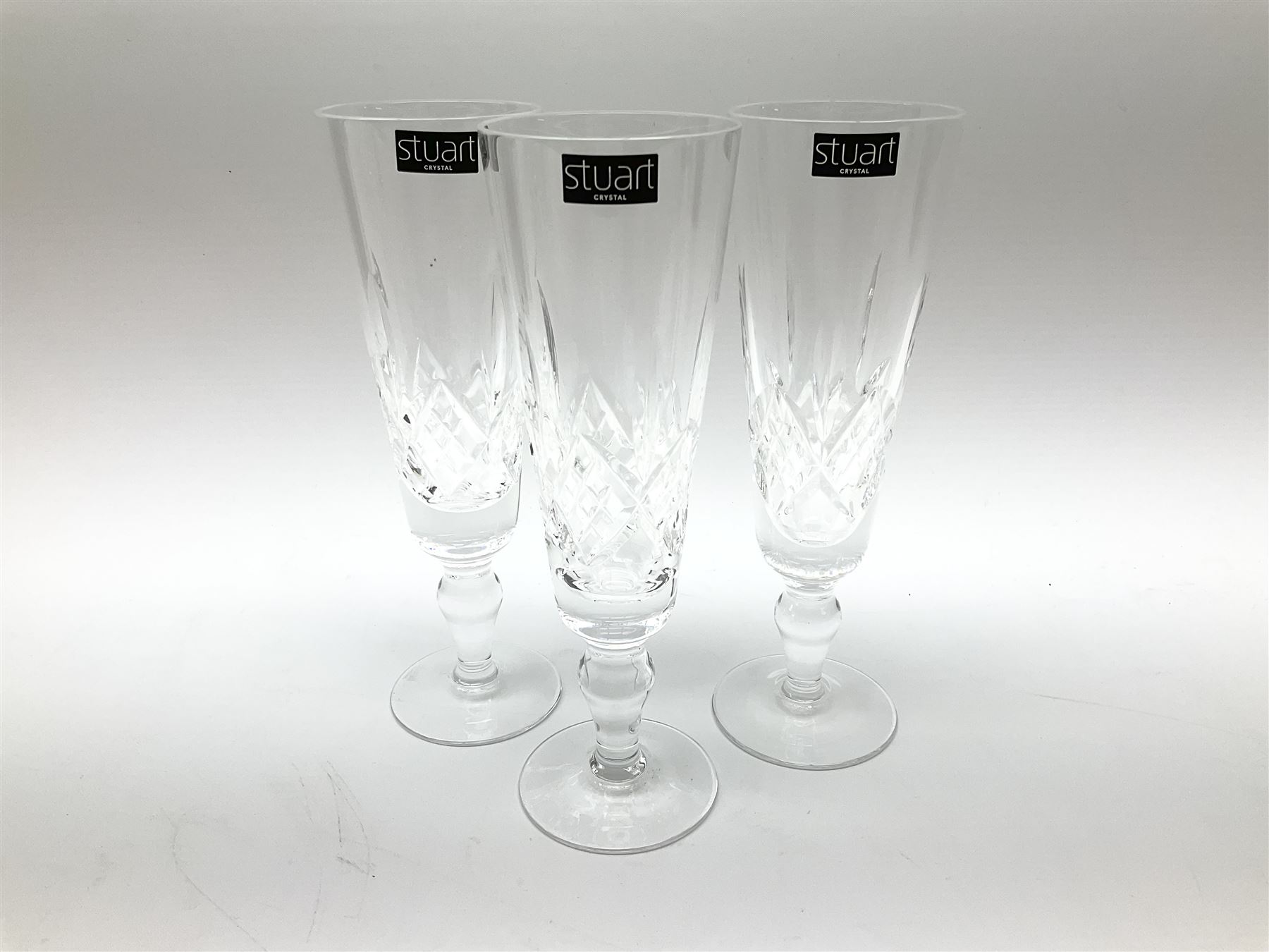Set of six Waterford Crystal sherry glasses, together with three Stuarts Crystal Glengarry pattern flutes, a Stuart Crystal ships decanter, and an Edinburgh Crystal square section decanter. 