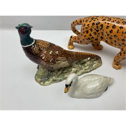 Group of Beswick figures to include leopard no 1082, rabbits, swan, pheasant no 1226 etc, all with marks beneath