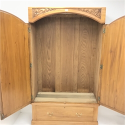 Early 20th century walnut double wardrobe, two mirrored doors enclosing hanging rail above single drawer, shaped plinth base, W113cm, H191cm, D43cm