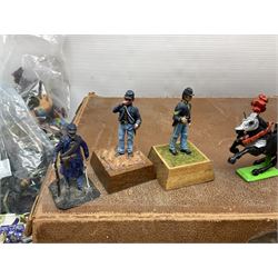 Large variety of predominantly metal miniature soldiers, a mixture of painted and non-painted figures, to include examples of American, British and European soldiers 